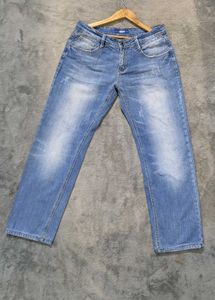 Light Wash Distressed Denim Jeans