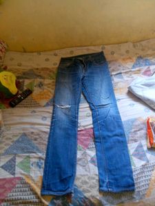 Distressed Blue Denim Jeans