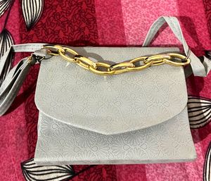 Stylish Grey Handbag with Gold Chain