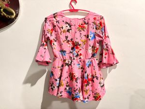 pink peplum top