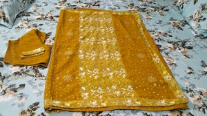 mustard totally new sari with stitch blouse