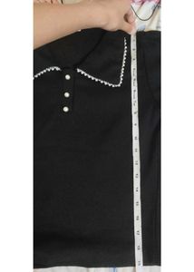 Chic Black Polo Top with Pearl Collar