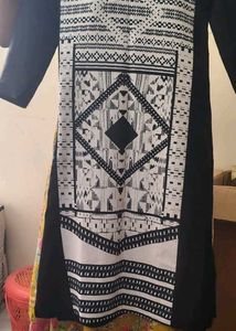 Stylish Black Tunic with Gold Line Art
