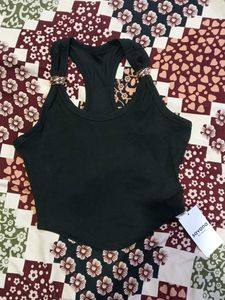 Chic Black Crop Top with Ring Details