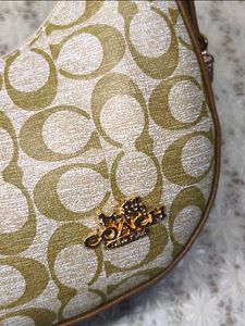 Stylish Hobo Bag with Signature Print
