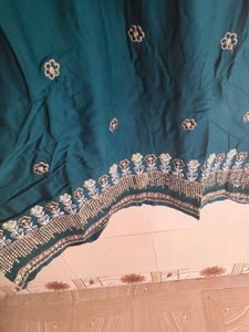 Elegant Teal Kurta with Embellished Neckline