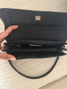 Chic Black Shoulder Bag with Chain Detail