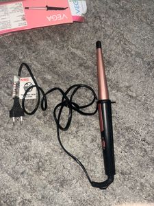 Vega I-Curl hair curler with a 0.5-1 inch tapered