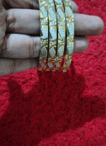 Elegant Gold Tone Bangles Set