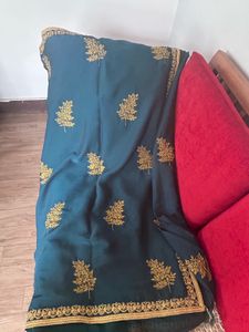 Elegant Teal Saree with Gold Embroidery