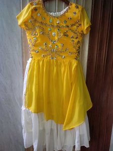 elegant white mirror work lehnga and yellow mirro