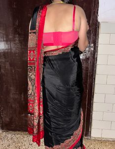Elegant Black butter crepe Saree with Red Border