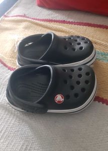 New black unisex bayaband Crocs for babies