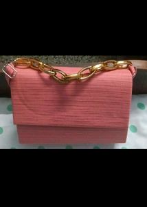 Chic Coral Clutch with Gold Chain