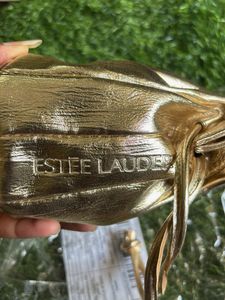 Estee Lauder Glamorous Gold Potli  Bag