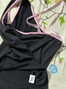 Chic Black One-Shoulder Top with Pink Ribbons
