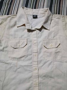 Cream Button-Up Shirt with Ruffle Hem