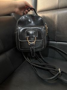 Chic Black Faux Leather Mini Backpack