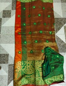 Orange Silk Saree with Green Blouse