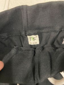 Black Joggers with "Go One Step Further" Graphic