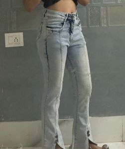 Light Wash Flared Jeans with Zipper Detail