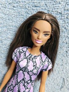 Stylish Barbie Doll in Purple Snake Print Dress