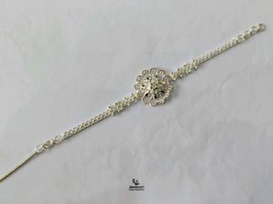 Elegant Pure Silver Flower Rakhi