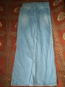 Light Wash Ripped Wide Leg Jeans