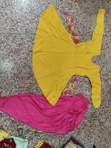 yellow frock  and  pink dhoti salwar