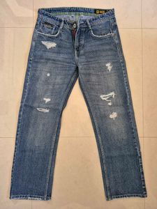 Distressed Blue Denim Jeans