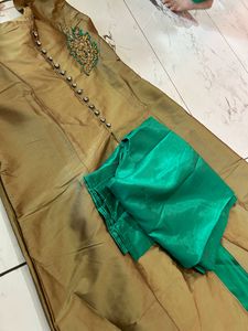 Green Heavy Skirt With Golden Cut Top
