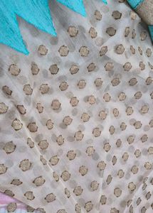 Elegant Beige Saree with Teal Border