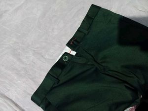 fitted dark green trousers (unisex)