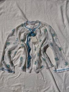 White Floral Blouse with Blue Ribbon