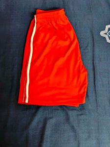 RED football and basketball shorts