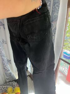 Distressed Black Jeans with Patches