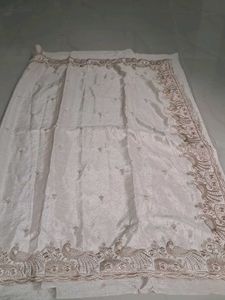 Elegant Cream Saree with Peacock Embroidery