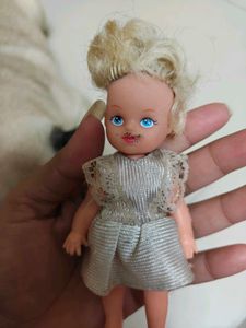 Vintage Doll with Silver Dress