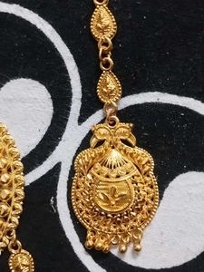 Elegant Gold Peacock Nath &amp; Maang Tikka Set