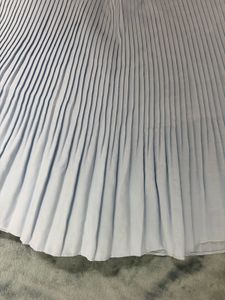 light blue pleated skirt