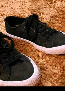 Black Canvas Sneakers available in coins