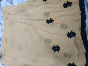 Elegant Peach Saree with Black Embroidery