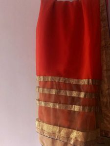 Elegant Orange Saree with Golden Border