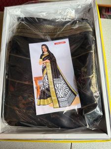 Elegant Black Saree with Golden Border