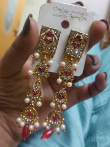 Elegant Gold Jhumka Earrings with Pearls