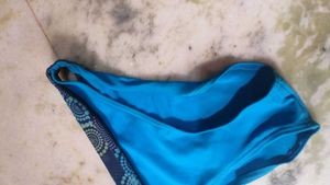 Stylish Blue Bikini Bottoms with Geometric Trim