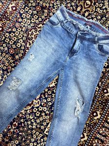 Ripped High-Waisted Jeans