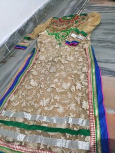 Elegant Cream Kurta with Red &amp; Green Embellishment
