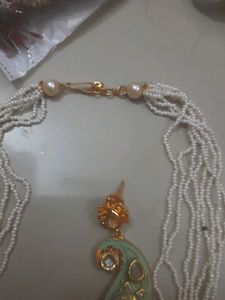 Green With White Kundan And Moti Maala