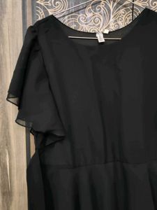 black flared dress